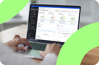 Person using a laptop displaying an SEO and accessibility dashboard with various performance metrics. The screen shows analytics, score breakdowns, and graphs for website optimization.